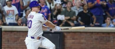 New York Mets first baseman Pete Alonso (20) hits a two run double in the first inning against the Atlanta Braves at Citi Field.