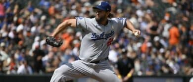 Los Angeles Dodgers pitcher Clayton Kershaw (22) throws a first inning pitch against the Baltimore Orioles at Oriole Park at Camden Yards.