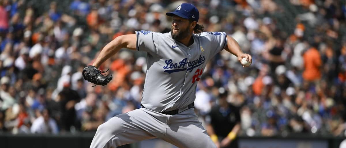Los Angeles Dodgers pitcher Clayton Kershaw (22) throws a first inning pitch against the Baltimore Orioles at Oriole Park at Camden Yards.