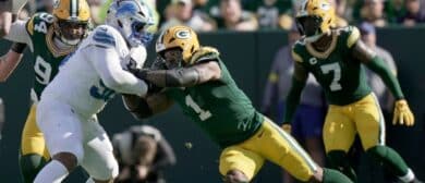 Detroit Lions offensive tackle Penei Sewell (58) blocks Green Bay Packers defensive end Micah Parsons (1) during the second quarter of their game Sunday, September 7, 2025 at Lambeau Field in Green Bay, Wisconsin.