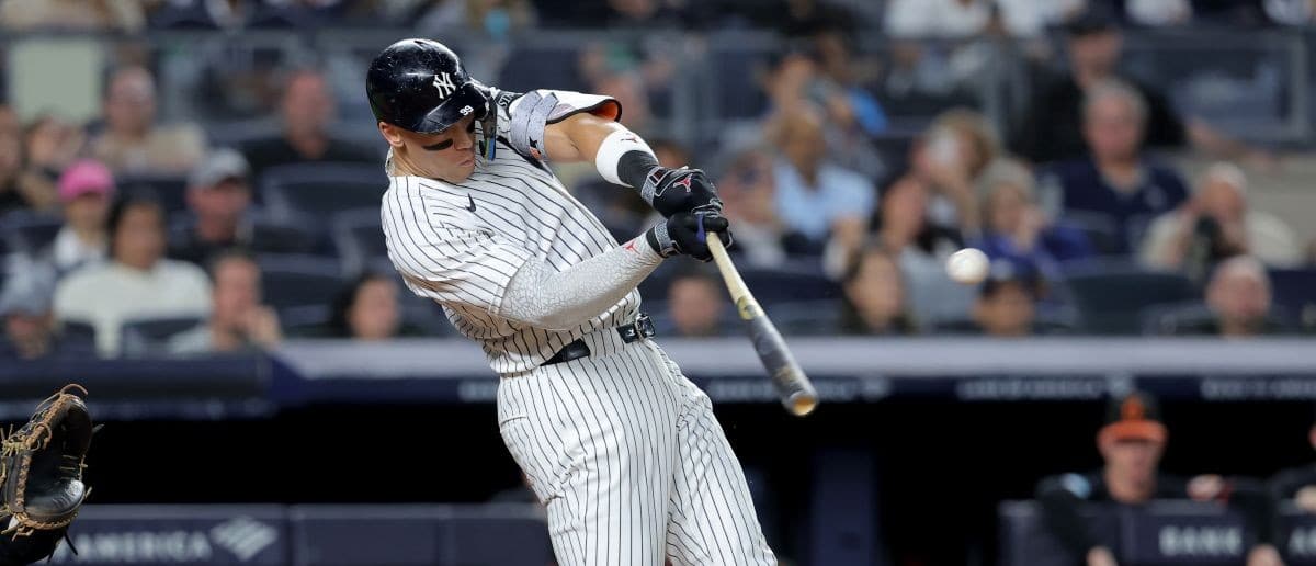 New York Yankees right fielder Aaron Judge (99) hits a two run home run against the Baltimore Orioles during the third inning at Yankee Stadium.