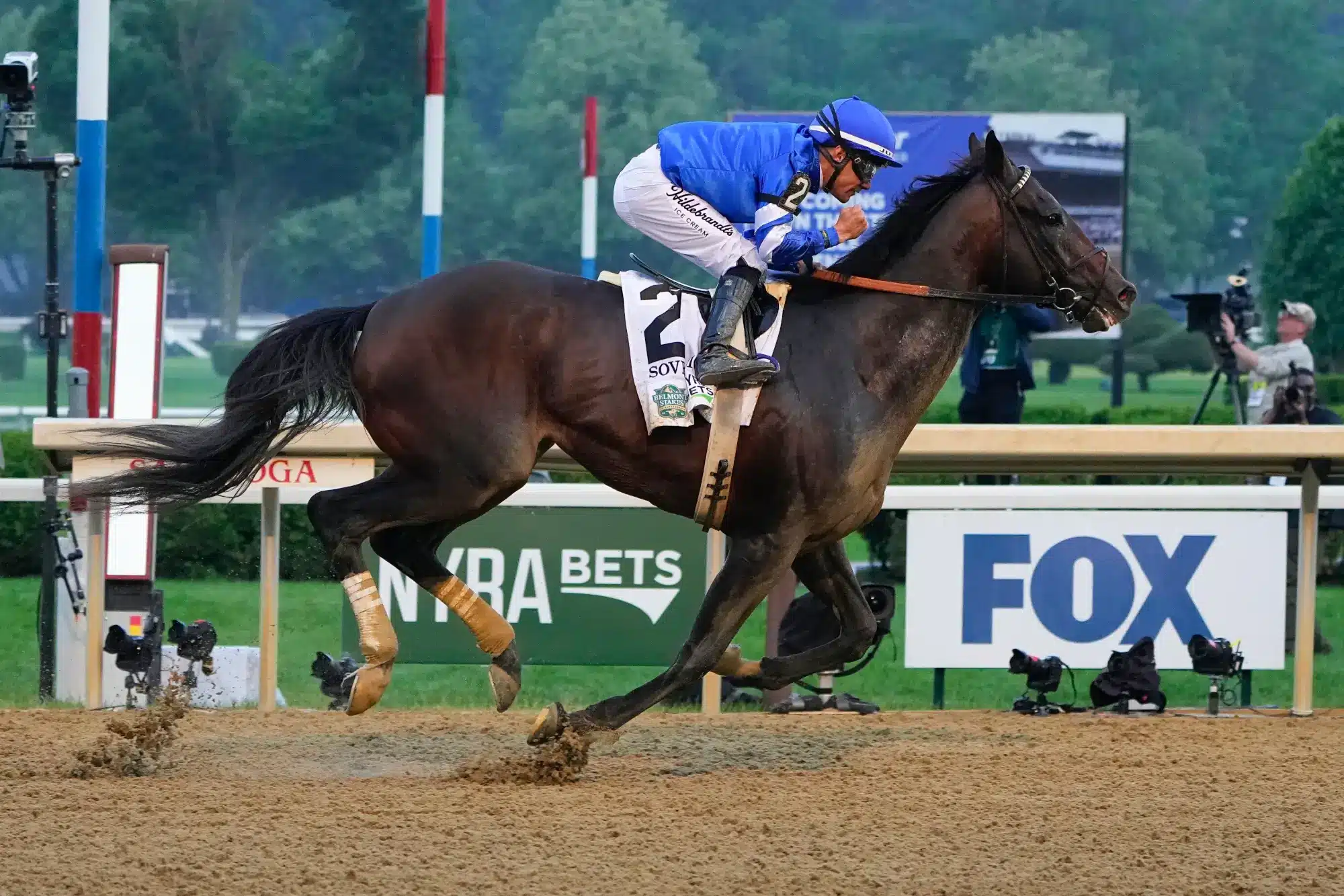 Jun 7, 2025; Saratoga, NY, USA; Sovereignty (2) with Junior Alvarado up wins the Belmont Stakes at Saratoga Race Course.