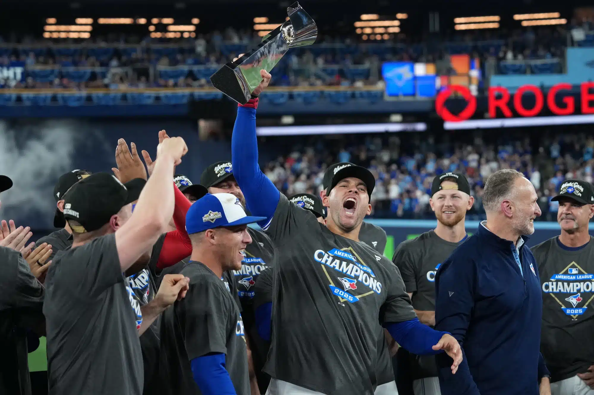 Oct 20, 2025; Toronto, Ontario, CAN; Toronto Blue Jays right fielder George Springer (4) celebrates after defeating the Seattle Mariners in game seven of the ALCS round for the 2025 MLB playoffs at Rogers Centre.