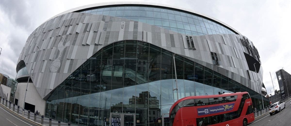 General overall view of a double decker bus in front of Tottenham Hotspur FC Stadium (White Hart Lane Stadium). The multi-purpose stadium features the world's first dividing, retractable football pitch and a synthetic turf pitch underneath for NFL games, concerts and other events. The Oakland Raiders will play host to the Chicago Bears in the first NFL game in an International Series game on Oct. 6, 2019