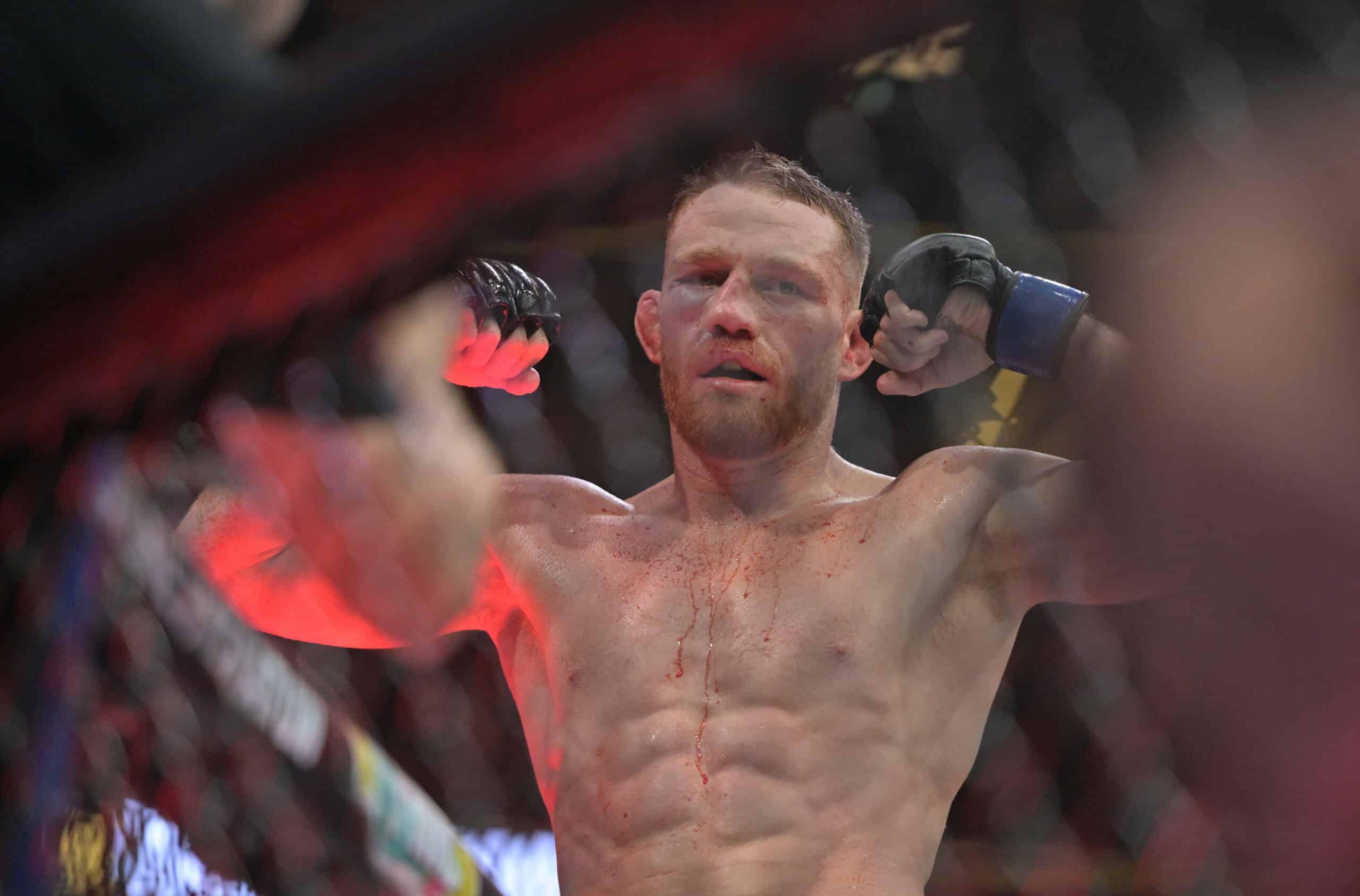 Jack Della Maddalena flexing in a UFC octagon after a fight