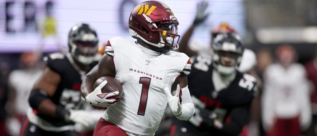 Washington Commanders wide receiver Deebo Samuel Sr. (1) runs during the first quarter against the Atlanta Falcons at Mercedes-Benz Stadium