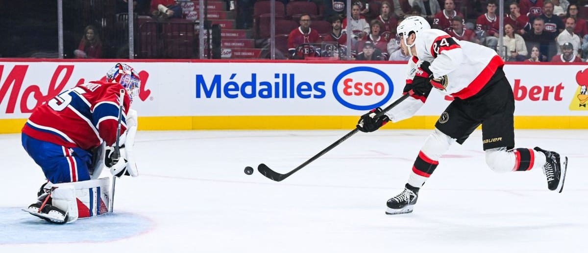 Ottawa Senators center Dylan Cozens (24) shoots the puck on Montreal Canadiens goalie Samuel Montembeault (35) during the second period at Bell Centre