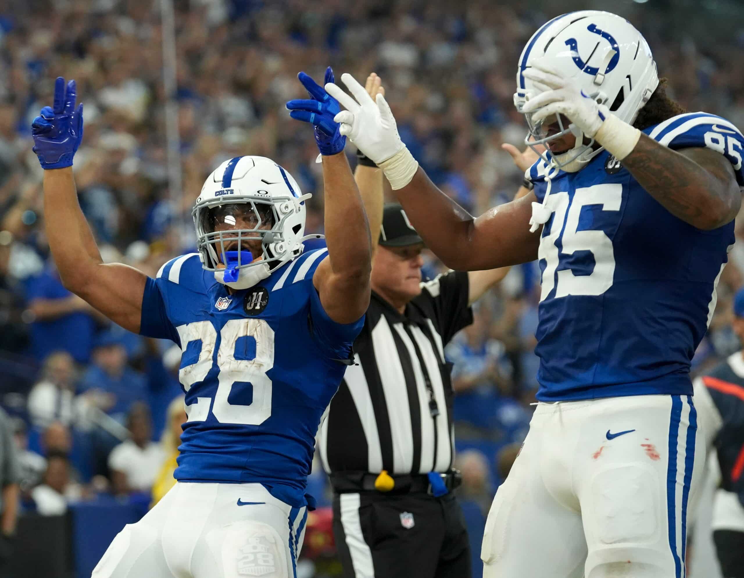 Indianapolis Colts players celebrate a touchdown in an NFL game in 2025.