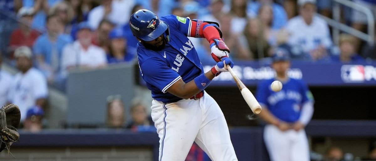 Toronto Blue Jays first baseman Vladimir Guerrero Jr. (27) hits a grand slam home run against the New York Yankees during the fourth inning of game two of the ALDS round for the 2025 MLB playoffs at Rogers Centre