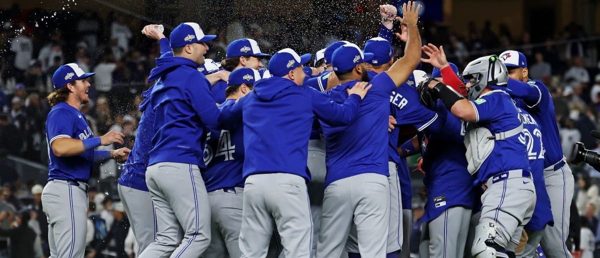 The Toronto Blue Jays celebrate after beating the New York Yankees to win the ALDS round for the 2025 MLB playoffs at Yankee Stadium.
