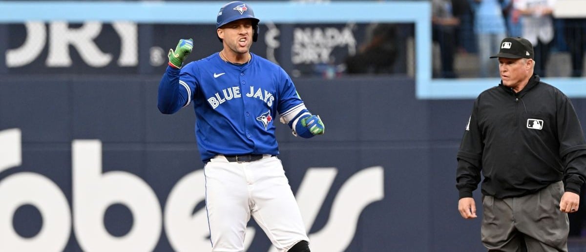 Toronto Blue Jays right fielder George Springer (4) reacts after hitting a double against the Seattle Mariners in the first inning during game two of the ALCS round for the 2025 MLB playoffs at Rogers Centre.