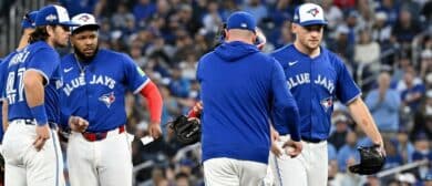 Toronto Blue Jays manager John Schneider (14) relieves pitcher Trey Yesavage (39) in the fifth inning against the Seattle Mariners during game two of the ALCS round for the 2025 MLB playoffs at Rogers Centre