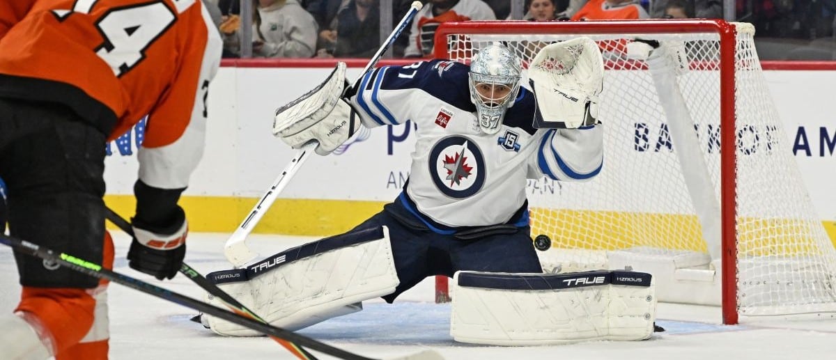 Philadelphia Flyers right wing Owen Tippett (74) scores a goal past Winnipeg Jets goaltender Connor Hellebuyck (37) during the second period at Wells Fargo Center.