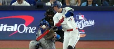 Toronto Blue Jays third baseman Ernie Clement (22) hits into a fielding error for a single against the Los Angeles Dodgers in the second inning during game two of the 2025 MLB World Series at Rogers Centre