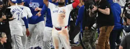 Oct 20, 2025; Toronto, Ontario, CAN; Toronto Blue Jays first baseman Vladimir Guerrero Jr. (27) celebrates with teammates after winning game seven of the ALCS round for the 2025 MLB playoffs against the Seattle Mariners at Rogers Centre.