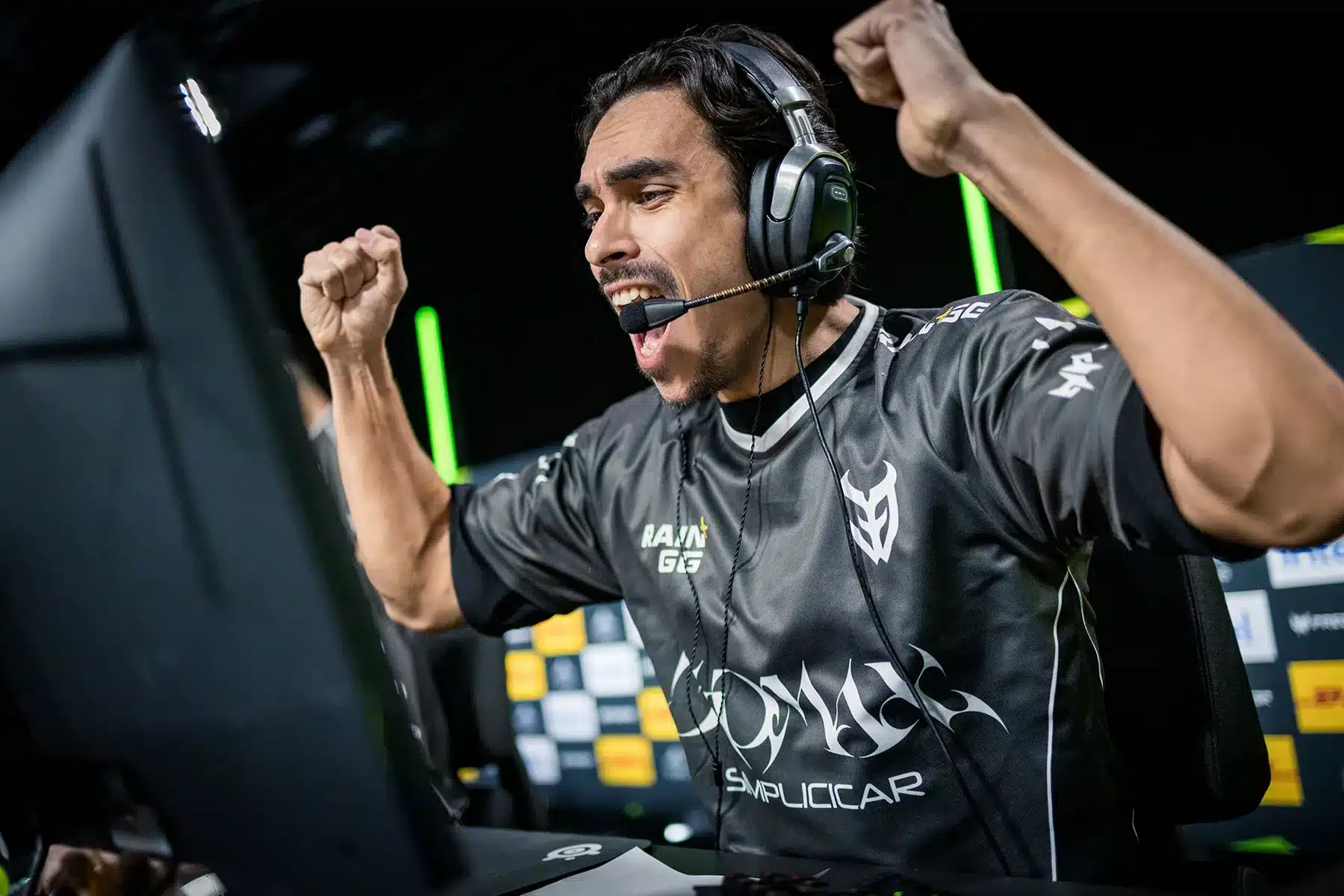 An esports gamers reacts in celebration after winning a stage at a esports tournament.