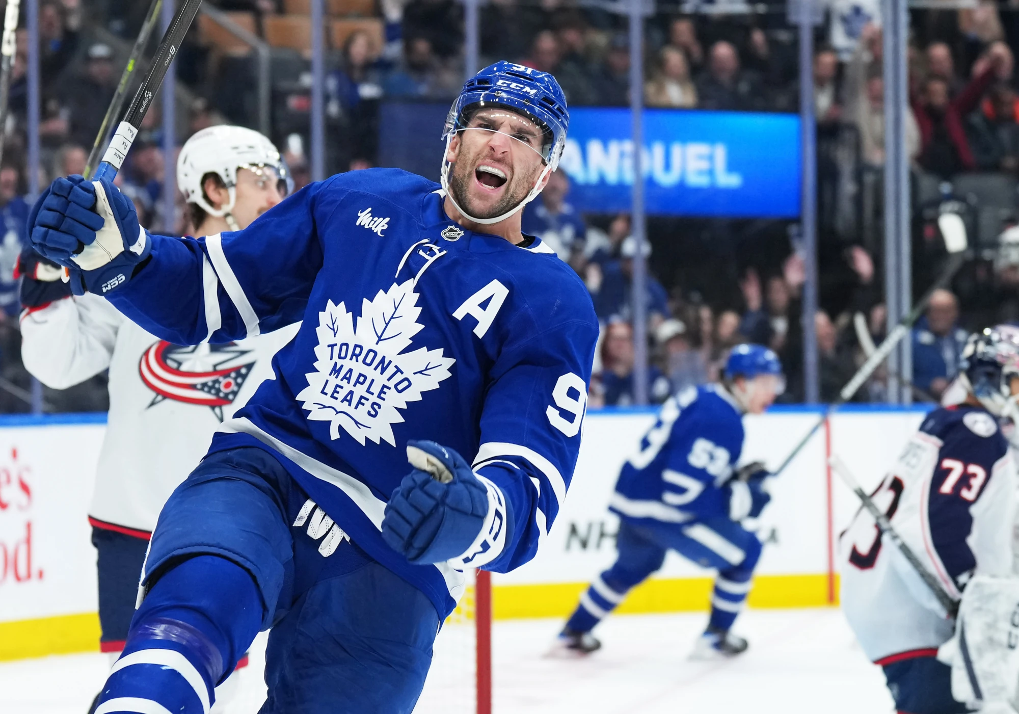 Nov 20, 2025; Toronto, Ontario, CAN; Toronto Maple Leafs center John Tavares (91) celebrates scoring a goal against the Columbus Blue Jackets during the third period at Scotiabank Arena. 