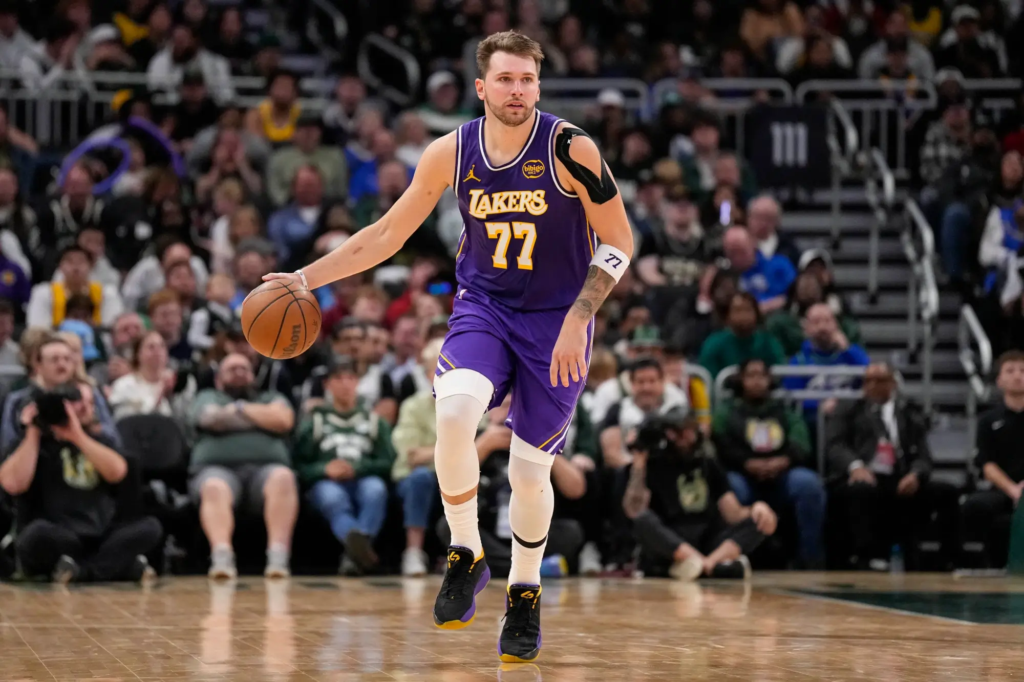 Nov 15, 2025; Milwaukee, Wisconsin, USA; Los Angeles Lakers guard Luka Doncic (77) during the game against the Milwaukee Bucks at Fiserv Forum.