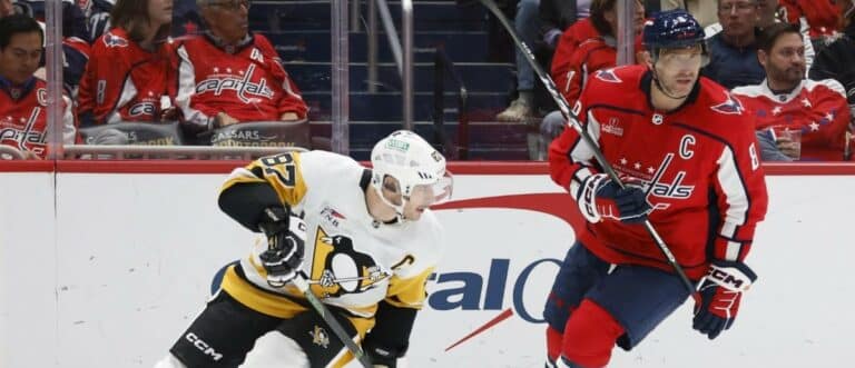 Pittsburgh Penguins center Sidney Crosby (87) and Washington Capitals left wing Alex Ovechkin (8) skate in the second period at Capital One Arena.