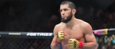 Islam Makhachev (red gloves) fights Dustin Poirier (blue gloves) during UFC 302 at Prudential Center