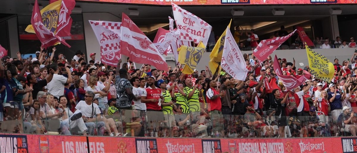 Arsenal fans show their support during a friendly match against Manchester United at SoFi Stadium.