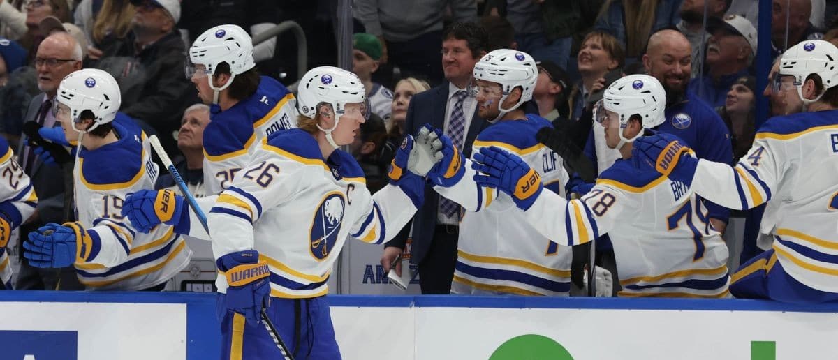 Buffalo Sabres defenseman Rasmus Dahlin (26) is congratulated after scoring against the Tampa Bay Lightning during the first period at Amalie Arena.