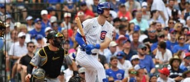 Chicago Cubs right fielder Kyle Tucker (30) hits a single during the eighth inning against the Pittsburgh Pirates at Wrigley Field