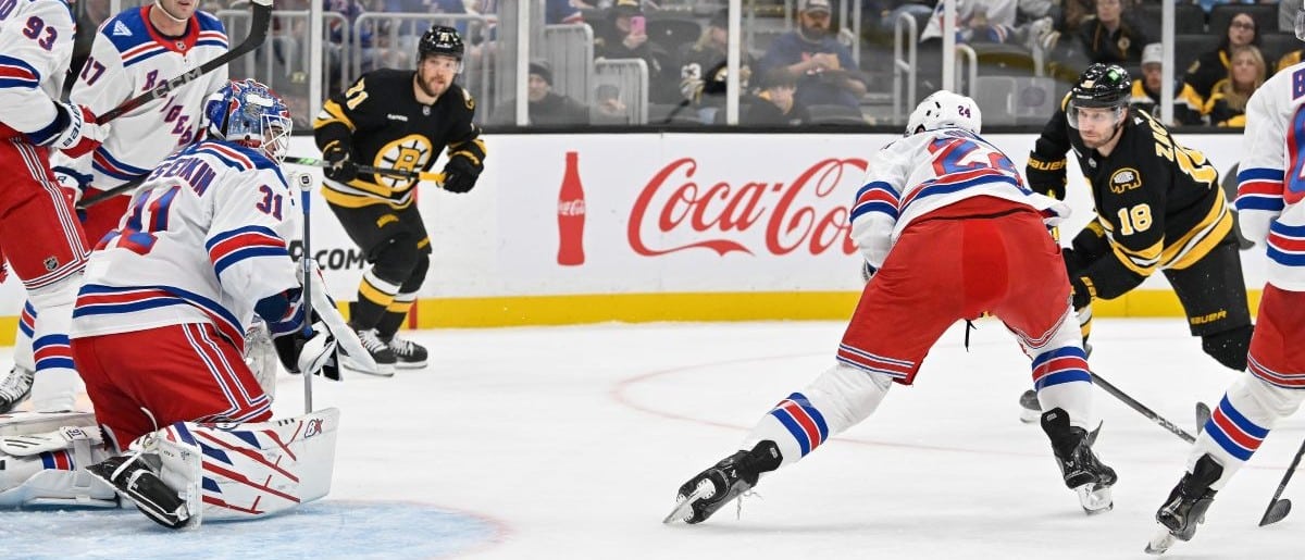 Boston Bruins center Pavel Zacha (18) scores a goal against New York Rangers goaltender Igor Shesterkin (31) during the first period at TD Garden.