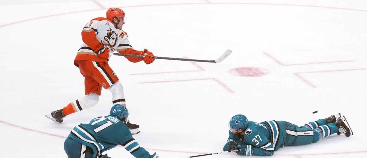 Anaheim Ducks center Leo Carlsson (top left) shoots and scores against San Jose Sharks defenseman Timothy Liljegren (37) during overtime at SAP Center at San Jose.