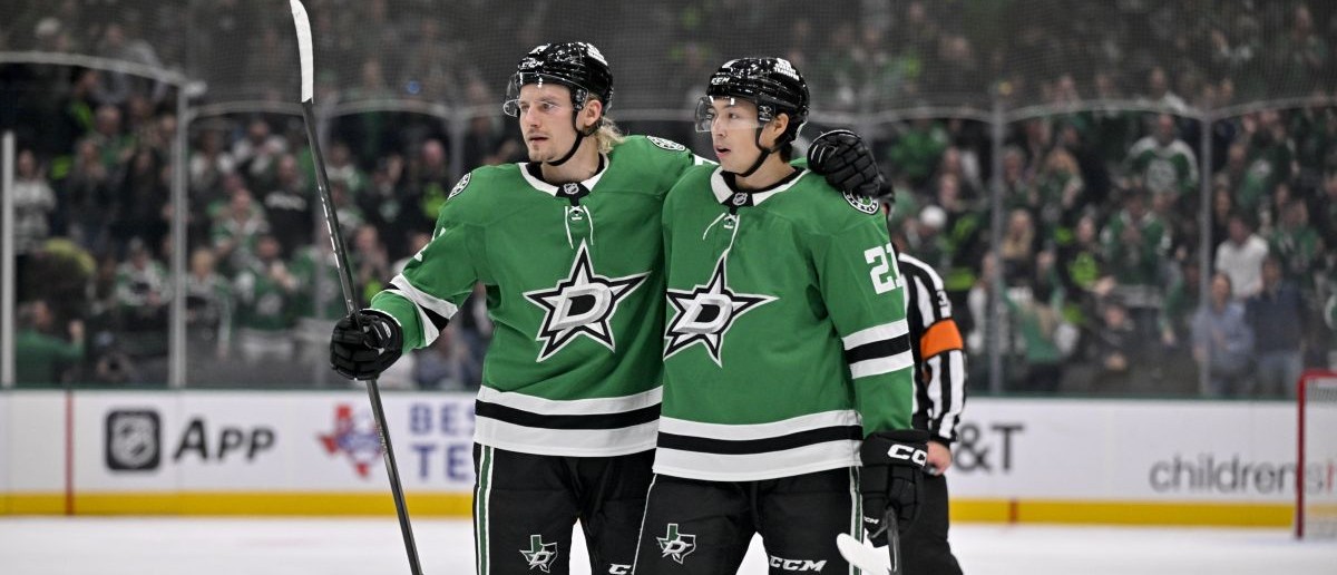 Dallas Stars center Roope Hintz (24) and left wing Jason Robertson (21) celebrates a goal scored by Robertson during the game between the Stars and the Kings at the American Airlines Center