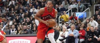Toronto Raptors guard Scottie Barnes (4) looks to pass the ball against the Houston Rockets during the first half at Scotiabank Arena