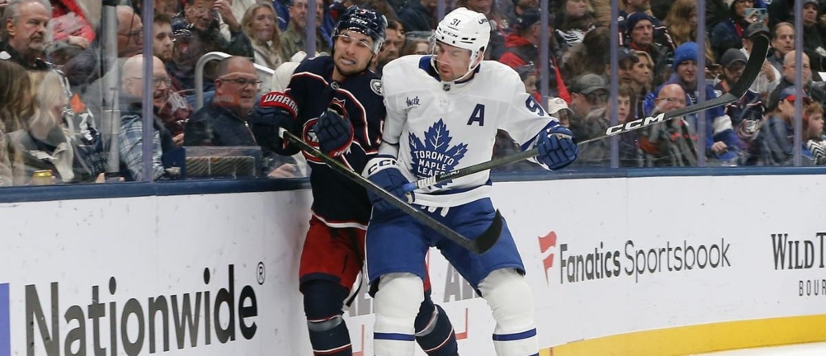 Toronto Maple Leafs center John Tavares (91) checks Columbus Blue Jackets defenseman Denton Mateychuk (5) during the first period at Nationwide Arena.