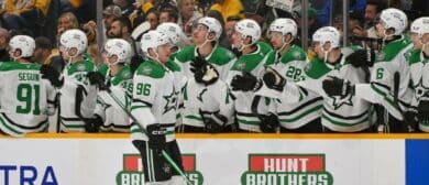 Dallas Stars right wing Mikko Rantanen (96) celebrates with his teammates after scoring a goal against the Nashville Predators during the third period at Bridgestone Arena.
