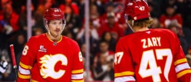Calgary Flames left wing Joel Farabee (86) and center Connor Zary (47) during the first period against the Columbus Blue Jackets at Scotiabank Saddledome