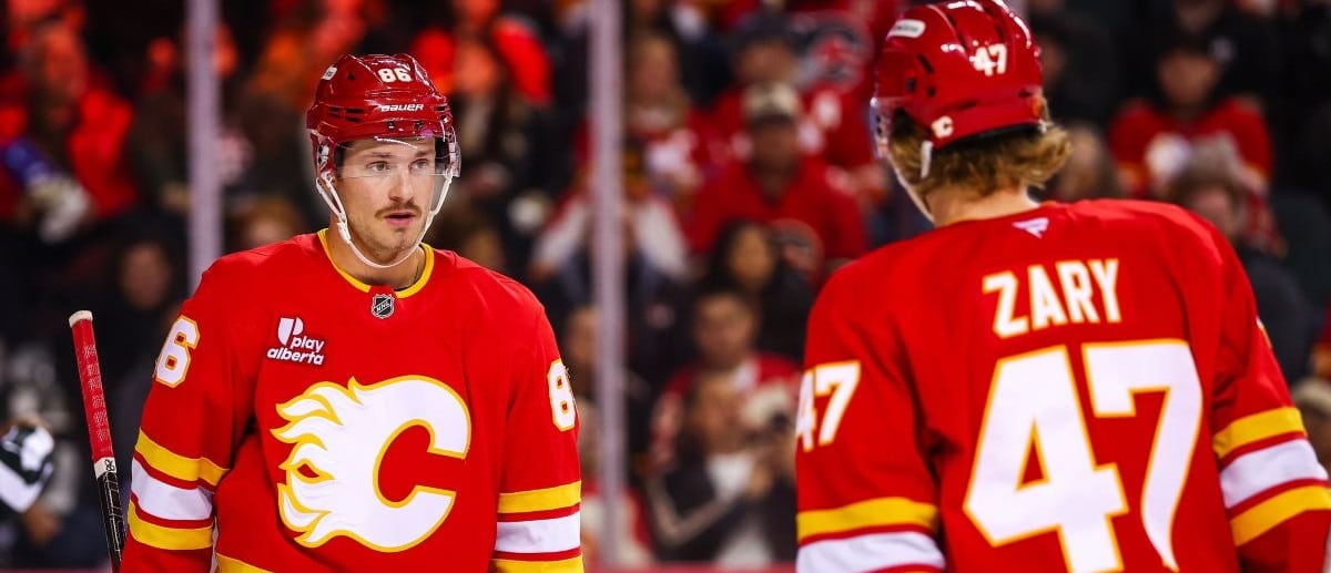Calgary Flames left wing Joel Farabee (86) and center Connor Zary (47) during the first period against the Columbus Blue Jackets at Scotiabank Saddledome