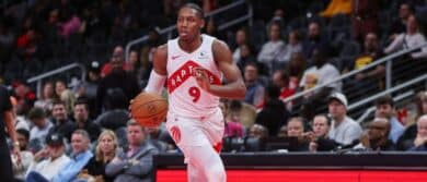 Toronto Raptors forward RJ Barrett (9) dribbles against the Atlanta Hawks in the fourth quarter at State Farm Arena