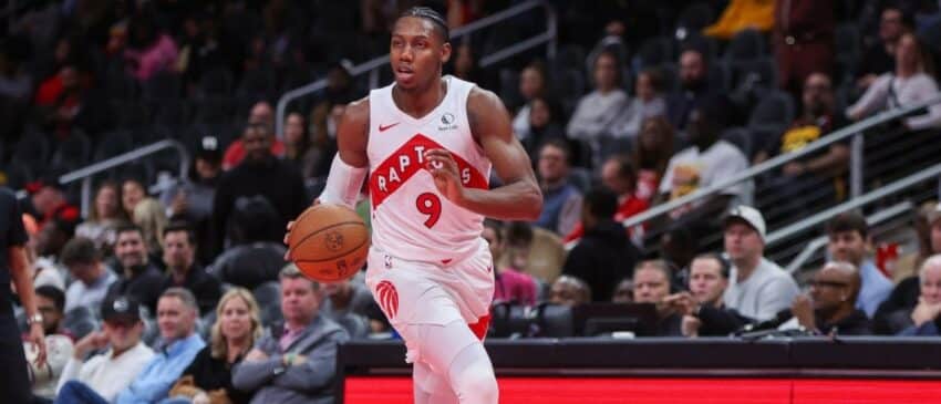 Toronto Raptors forward RJ Barrett (9) dribbles against the Atlanta Hawks in the fourth quarter at State Farm Arena