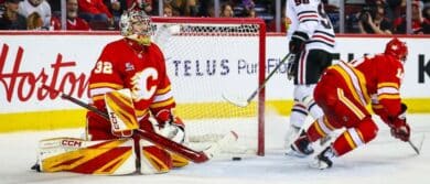 Chicago Blackhawks center Connor Bedard (98) scores a goal against Calgary Flames goaltender Dustin Wolf (32) during the third period at Scotiabank Saddledome