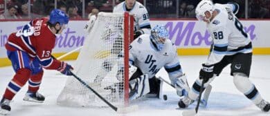 Montreal Canadiens forward Cole Caufield (13) scores a goal against Utah Mammoth goalie Karel Vejmelka (70) during the third period at the Bell Centre.