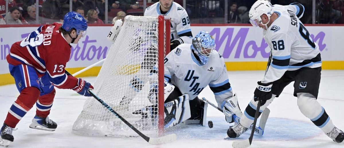 Montreal Canadiens forward Cole Caufield (13) scores a goal against Utah Mammoth goalie Karel Vejmelka (70) during the third period at the Bell Centre.