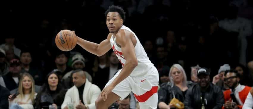 Toronto Raptors forward Scottie Barnes (4) brings the ball up court against the Brooklyn Nets during the second quarter at Barclays Center.