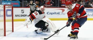New Jersey Devils goaltender Jake Allen (34) makes a save against on Washington Capitals left wing Alex Ovechkin (8) in a shootout at Capital One Arena.
