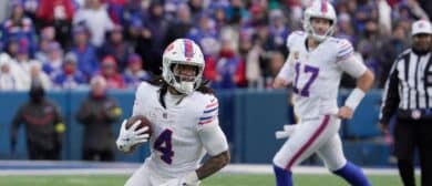 Buffalo Bills running back James Cook III runs with teh ball after catching a short pass from quarterback Josh Allen during second half action against the Tampa Bay Buccaneers on Nov 16, 2025 at Highmark Stadium in Orchard Park.