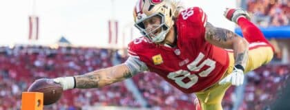 San Francisco 49ers tight end George Kittle (85) scores a touchdown during the fourth quarter against the Los Angeles Rams at Levi's Stadium