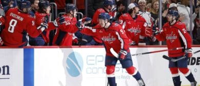 Washington Capitals right wing Ryan Leonard (9) celebrates with teammates after scoring a goal against the Edmonton Oilers during the second period at Capital One Arena.