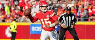 Kansas City Chiefs quarterback Patrick Mahomes (15) looks to pass against the Indianapolis Colts in the second quarter at GEHA Field at Arrowhead Stadium