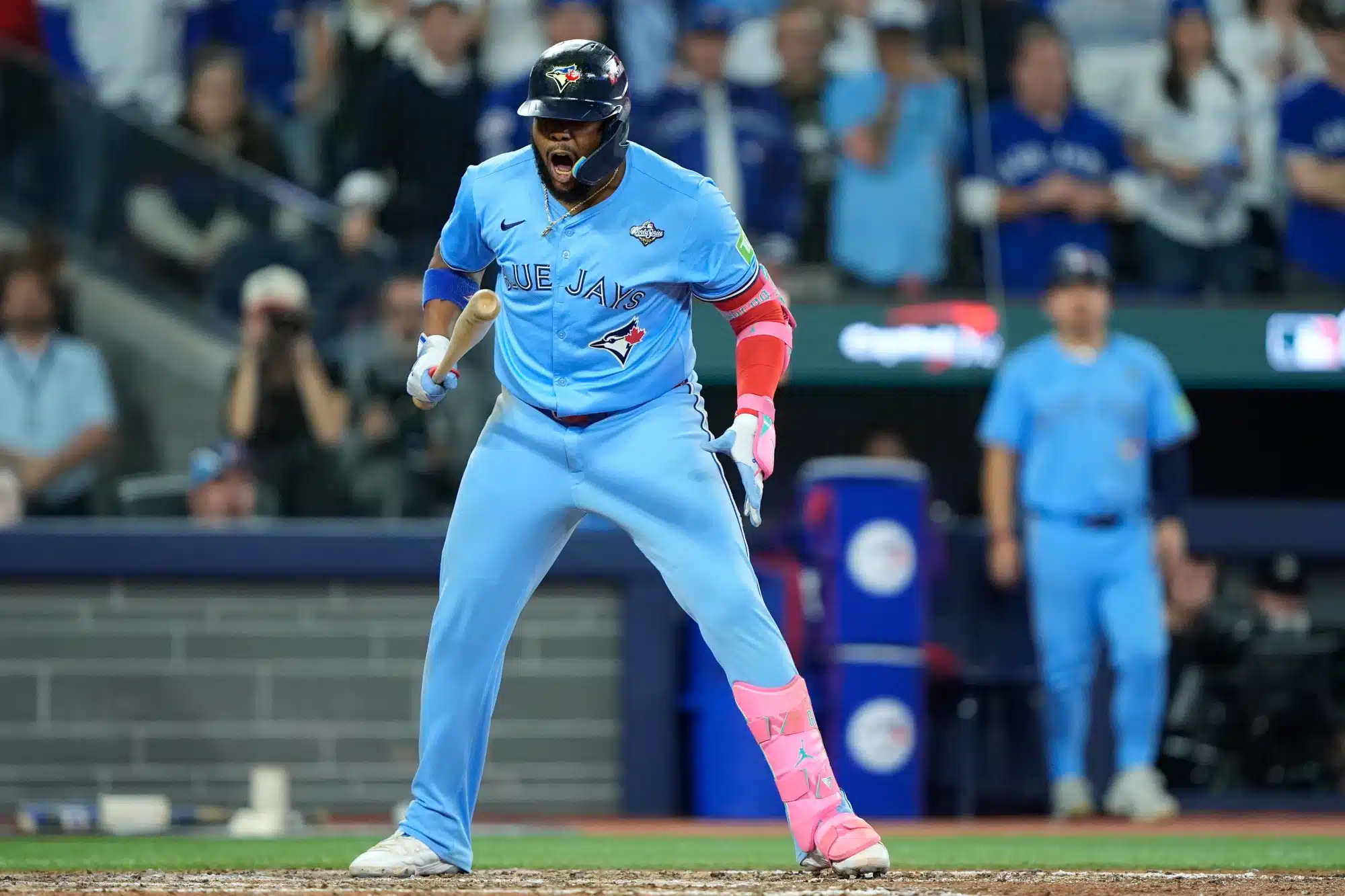 Oct 31, 2025; Toronto, Ontario, CAN; Toronto Blue Jays first baseman Vladimir Guerrero Jr. (27) reacts after walking against the Los Angeles Dodgers in the eighth inning during game six of the 2025 MLB World Series at Rogers Centre.