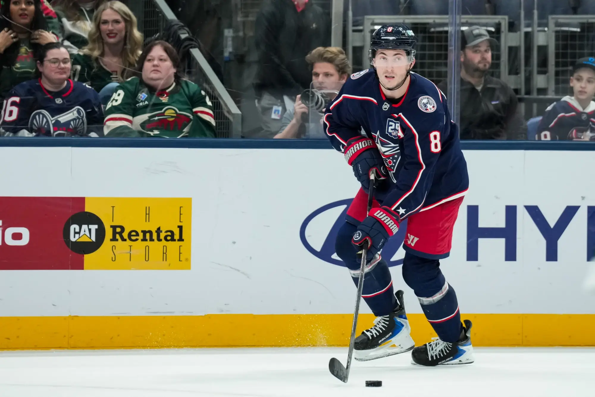 Dec 18, 2025; Columbus, Ohio, USA; Columbus Blue Jackets defenseman Zach Werenski (8) skates with the puck against the Minnesota Wild in the third period at Nationwide Arena.