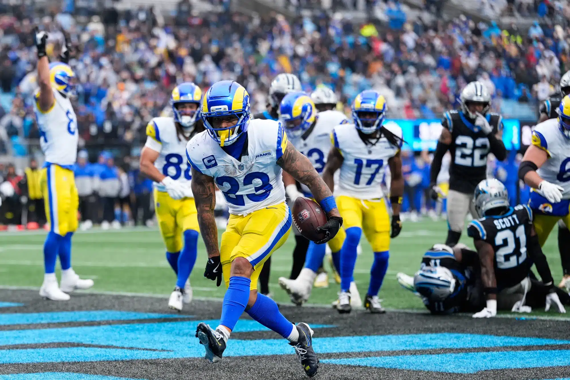 Nov 30, 2025; Charlotte, North Carolina, USA; Los Angeles Rams running back Kyren Williams (23) scores a touchdown during the fourth quarter against the Carolina Panthers at Bank of America Stadium.