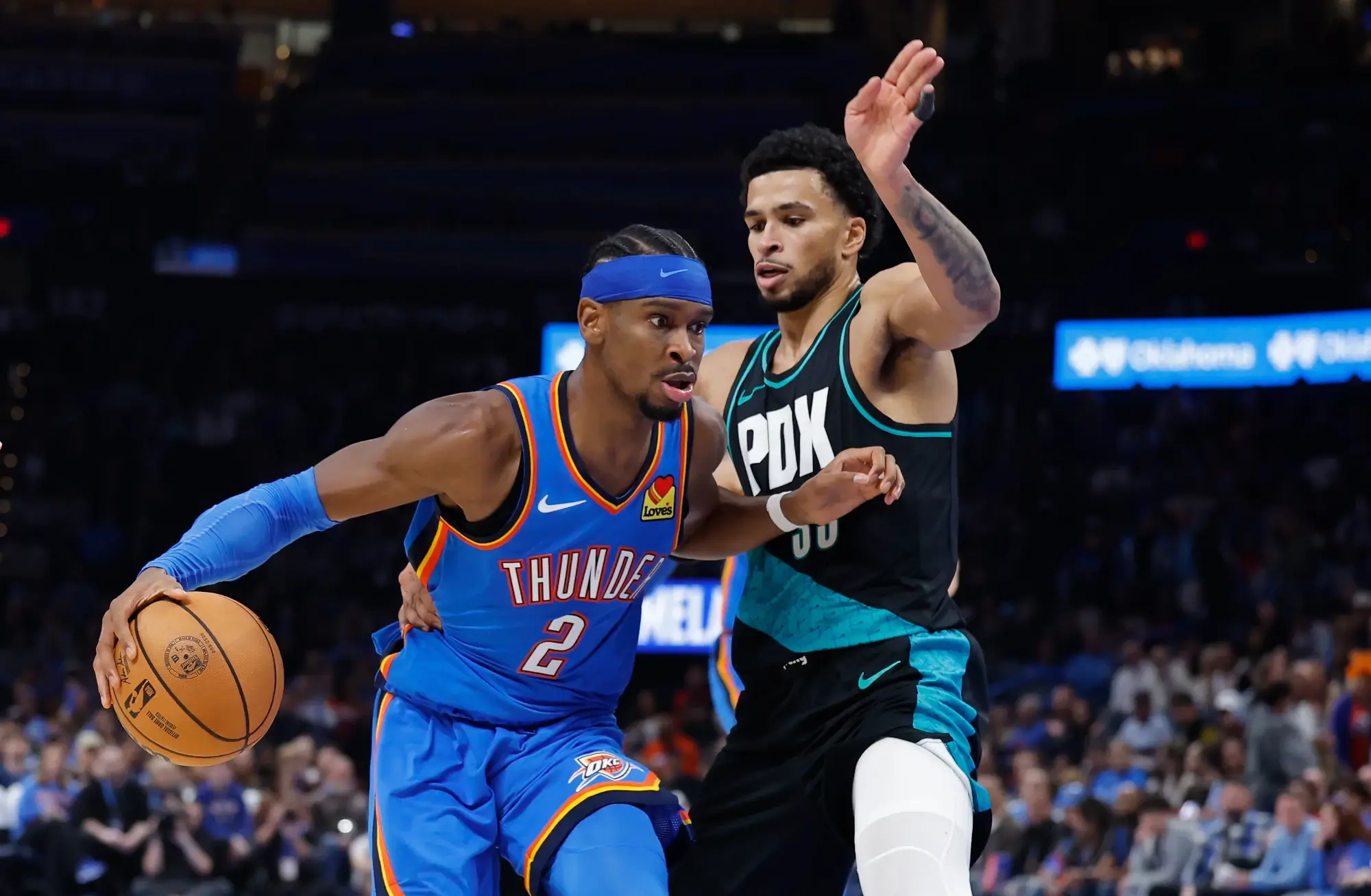 Nov 23, 2025; Oklahoma City, Oklahoma, USA; Oklahoma City Thunder guard Shai Gilgeous-Alexander (2) moves past Portland Trail Blazers forward Toumani Camara (33) during the second half at Paycom Center.
